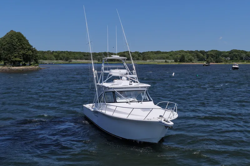 Slide: The Image of 2022 Albemarle 360 Express Fisherman boat cruising on a sunny day. - 3