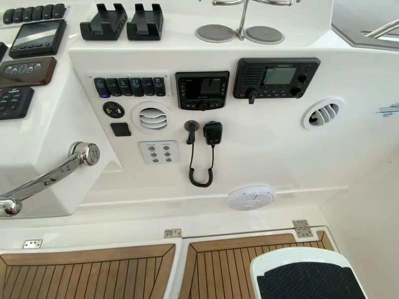 Slide: The Image of Control panel of 2022 Albemarle 360 Express Fisherman boat with electronic equipment. - 36