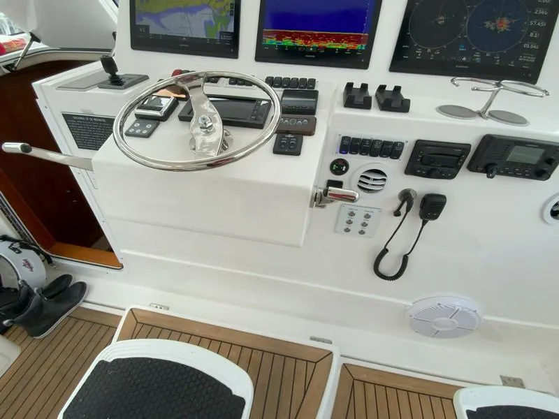 Slide: The Image of 2022 Albemarle 360 Express Fisherman helm with advanced navigation and control systems. - 38