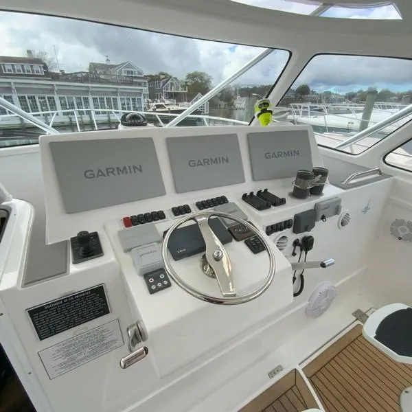 Slide: The Image of 2022 Albemarle 360 Express Fisherman helm with Garmin displays and controls. - 39
