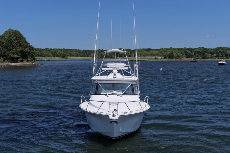 Slide: The Image of 2022 Albemarle 360 Express Fisherman boat on a scenic lake. - 4