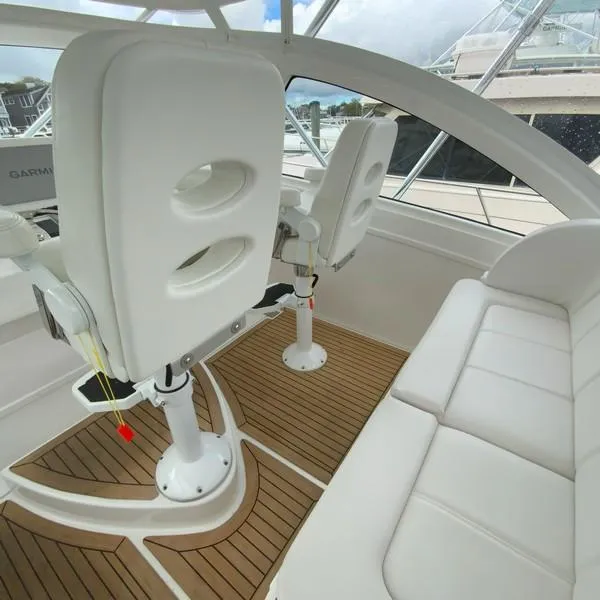 Slide: The Image of 2022 Albemarle 360 Express Fisherman interior with white seating and wooden flooring. - 46