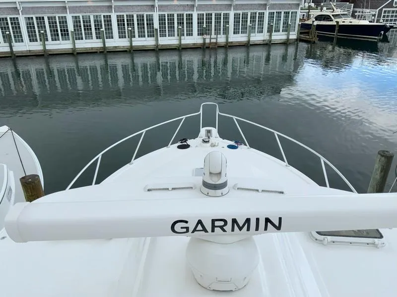 Slide: The Image of Albemarle 360 Express Fisherman 2022 with Garmin radar, docked near waterfront buildings. - 52