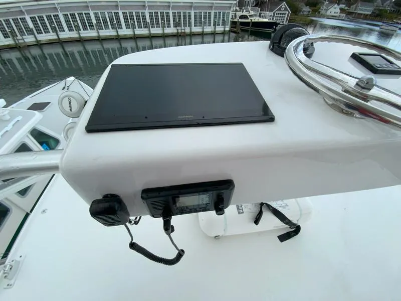 Slide: The Image of Control panel of 2022 Albemarle 360 Express Fisherman boat with navigation equipment. - 54