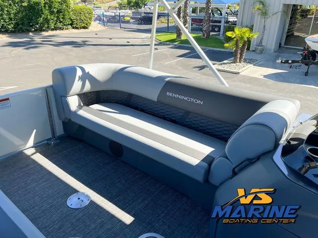 Slide: The Image of 2024 Bennington 22 SSR boat interior with gray seating at VS Marine Boating Center. - 12