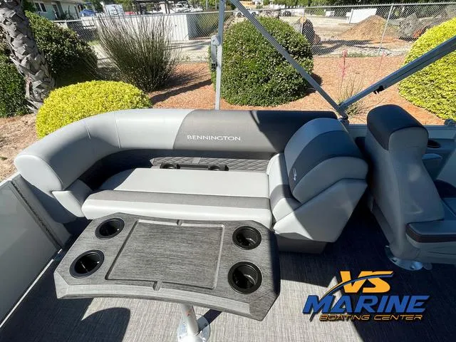 Slide: The Image of 2024 Bennington 22 SSR boat seat with armrests and cup holders, VS Marine logo visible. - 16