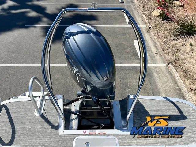 Slide: The Image of 2024 Bennington 22 SSR pontoon boat interior with seating and table, VS Marine logo visible. - 17