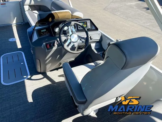 Slide: The Image of 2024 Bennington 22 SSR boat interior with cushioned seating and cup holders. - 19