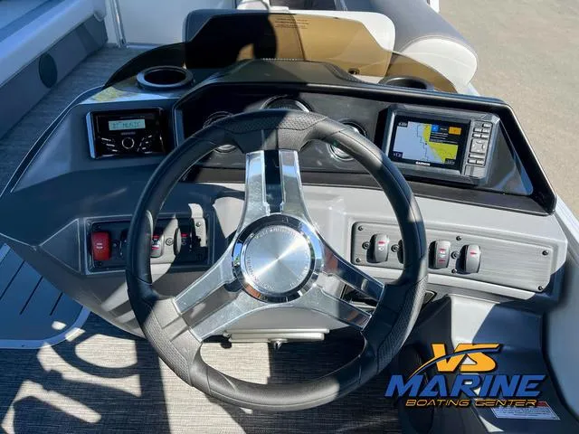 Slide: The Image of 2024 Bennington 22 SSR boat interior with steering console and seating at VS Marine Boating Center. - 20