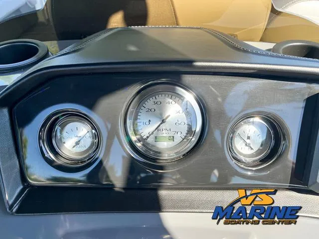 Slide: The Image of Garmin navigation system on 2024 Bennington 22 SSR boat dashboard, VS Marine logo visible. - 24