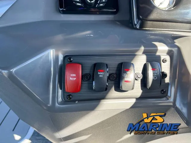 Slide: The Image of 2024 Bennington 22 SSR boat dashboard with Kicker media center and VS Marine logo. - 26