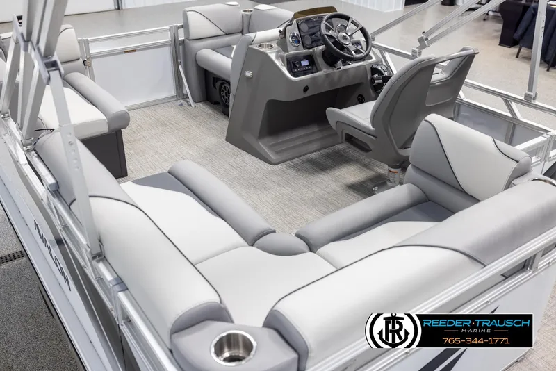 Slide: The Image of Interior of 2025 Avalon VEN CR boat with modern seating and steering console. - 10