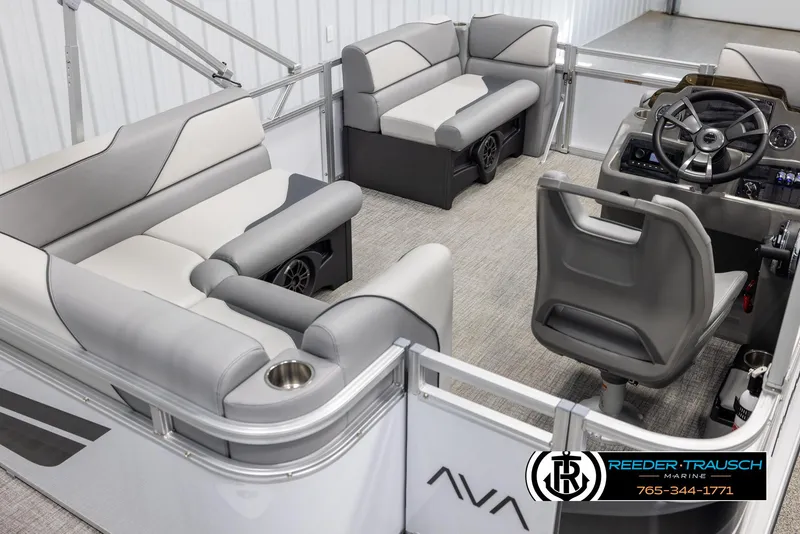 Slide: The Image of 2025 Avalon VEN CR pontoon boat interior with gray seating and modern steering console. - 11