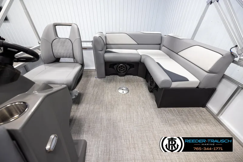 Slide: The Image of Interior of 2025 Avalon VEN CR boat with modern seating and steering console. - 13