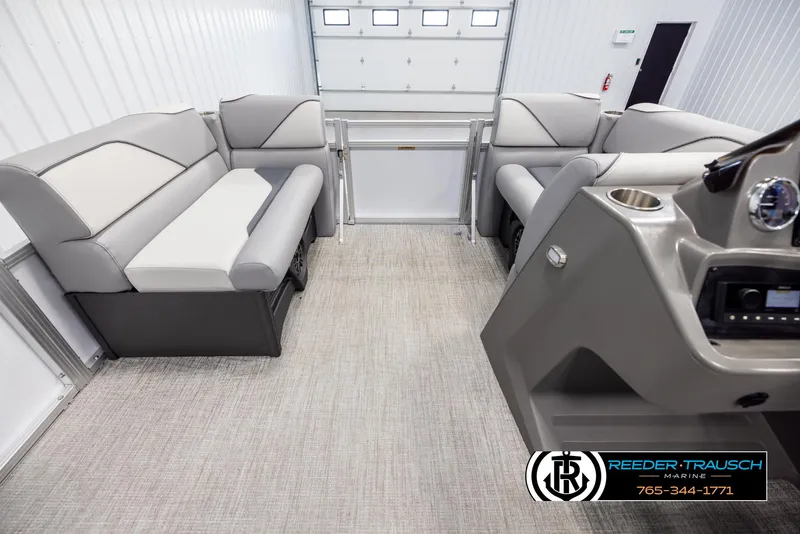 Slide: The Image of Luxurious interior of 2025 Avalon VEN CR boat with plush seating and modern dashboard. - 15