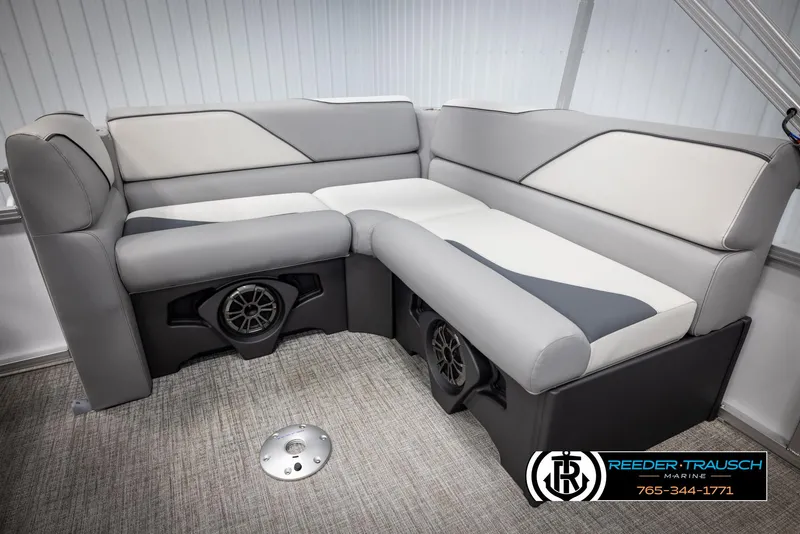 Slide: The Image of Luxurious 2025 Avalon VEN CR boat seating with integrated speakers, featuring modern gray and white upholstery. - 18