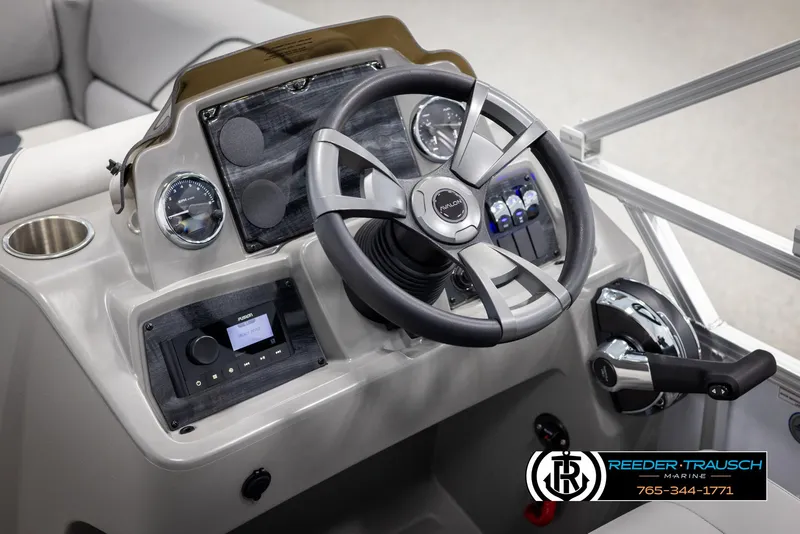 Slide: The Image of Steering console of 2025 Avalon VEN CR boat with modern controls and gauges. - 23
