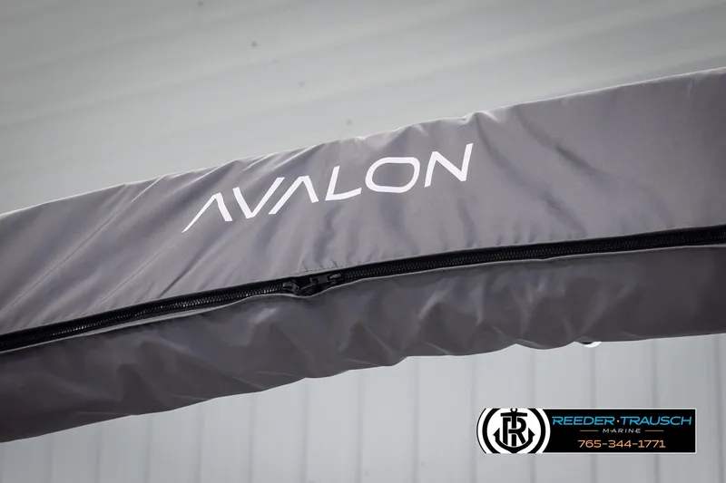 Slide: The Image of Gray Avalon VEN CR 2025 boat cover with logo, displayed at Reeder-Trausch Marine. - 33