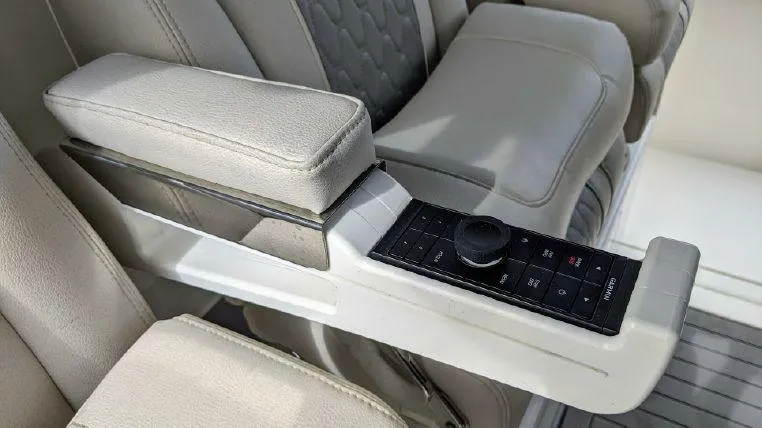 Slide: The Image of 2022 Solace 41 CS interior armrest with integrated control panel. - 16