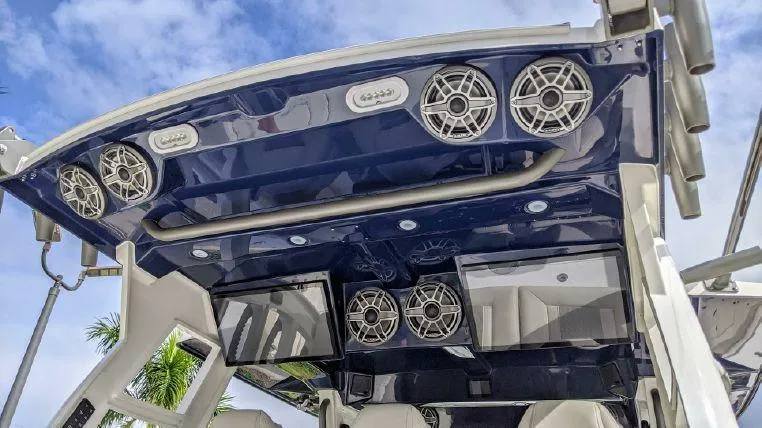 Slide: The Image of 2022 Solace 41 CS boat speakers and canopy, showcasing modern marine audio system. - 18
