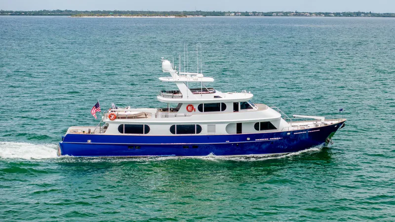 Slide: The Image of 1975 Stephens Brothers Expedition yacht cruising on open water. - 11