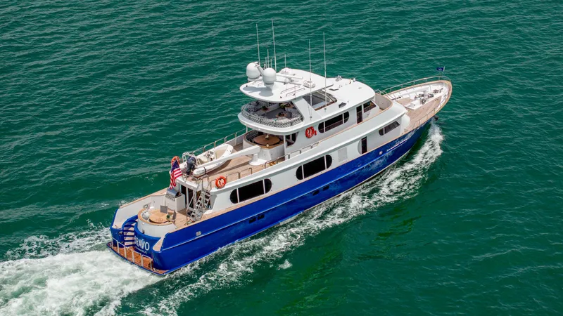 Slide: The Image of Aerial view of 1975 Stephens Brothers Expedition yacht cruising on the ocean. - 12