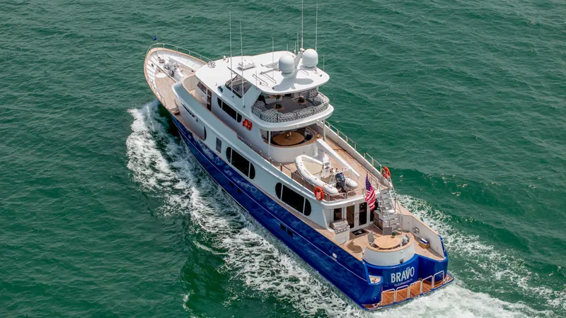 Slide: The Image of Aerial view of 1975 Stephens Brothers Expedition yacht cruising on the ocean. - 13