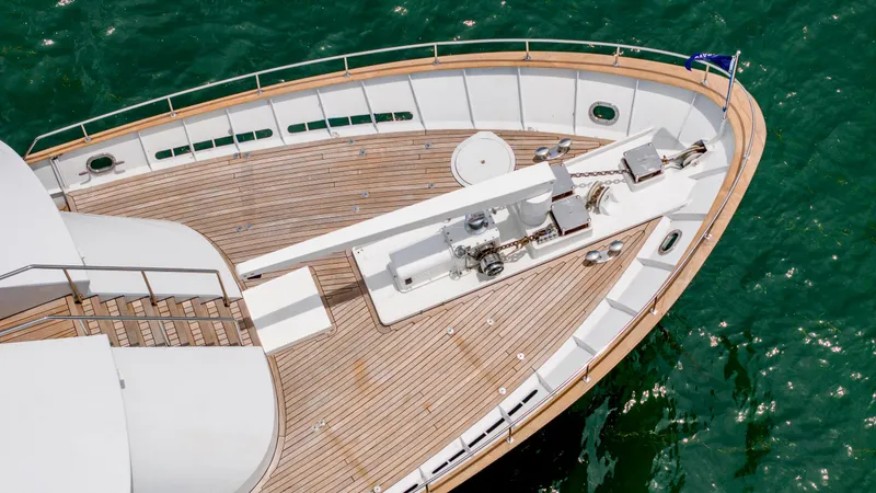 Slide: The Image of Aerial view of 1975 Stephens Brothers Expedition yacht deck on green water. - 22