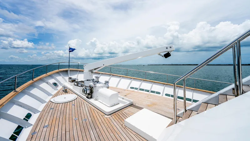 Slide: The Image of 1975 Stephens Brothers Expedition yacht deck with ocean view and clear sky. - 24