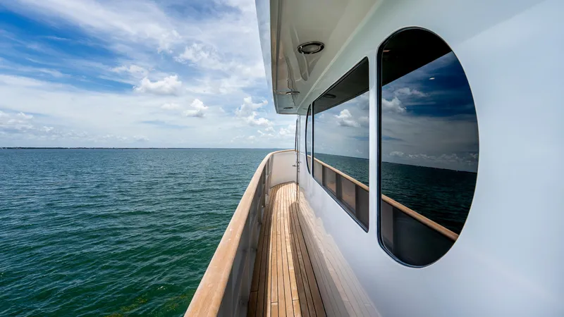 Slide: The Image of Side view of 1975 Stephens Brothers Expedition yacht on open sea under blue sky. - 30