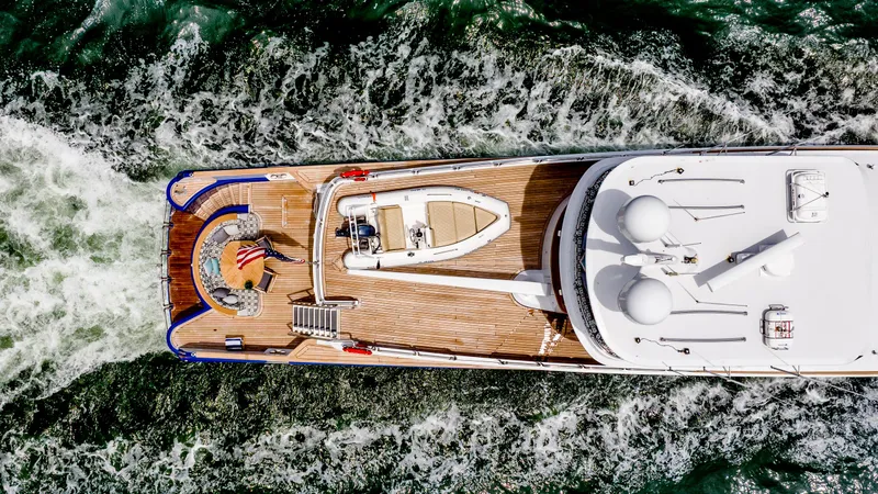 Slide: The Image of Aerial view of 1975 Stephens Brothers Expedition yacht cruising through water. - 32