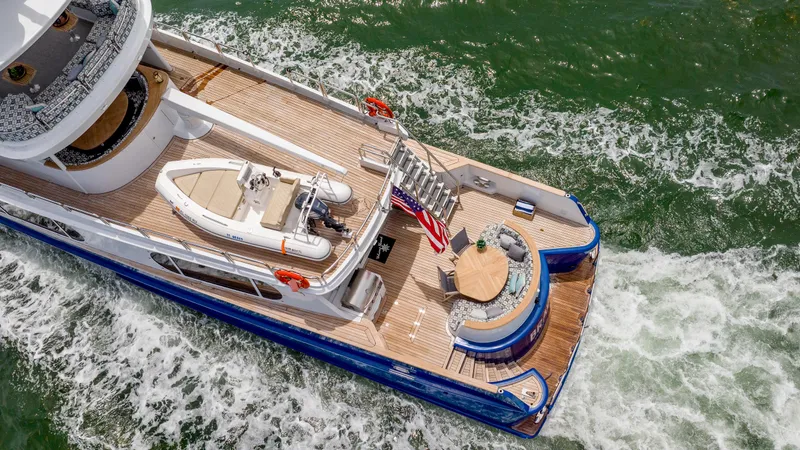 Slide: The Image of Aerial view of 1975 Stephens Brothers Expedition yacht cruising on water. - 34