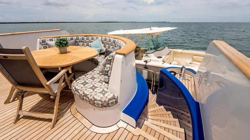 Slide: The Image of Luxurious 1975 Stephens Brothers Expedition yacht deck with seating and ocean view. - 43