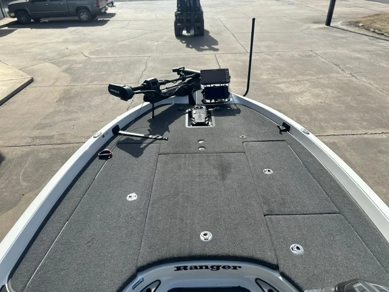 Slide: The Image of 2021 Ranger Z520C boat deck with fishing equipment and electronics. - 6