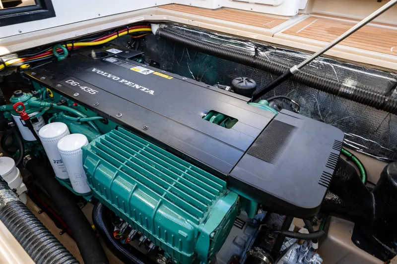 Slide: The Image of Volvo Penta engine in 2016 Cutwater 30 Command Bridge boat, showcasing detailed components. - 10