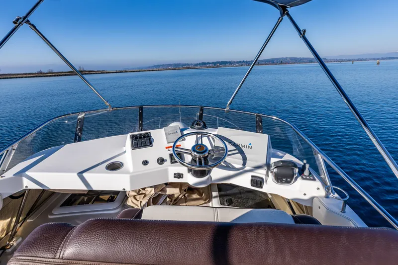 Slide: The Image of 2016 Cutwater 30 Command Bridge helm with ocean view. - 12