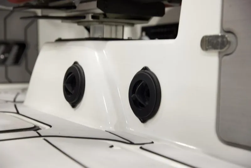 Slide: The Image of 2021 Malibu 25 LSV boat interior detail with black speaker vents. - 15