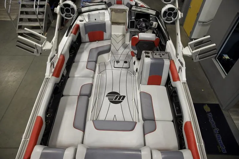 Slide: The Image of 2021 Malibu 25 LSV boat interior with stylish seating and modern design. - 9