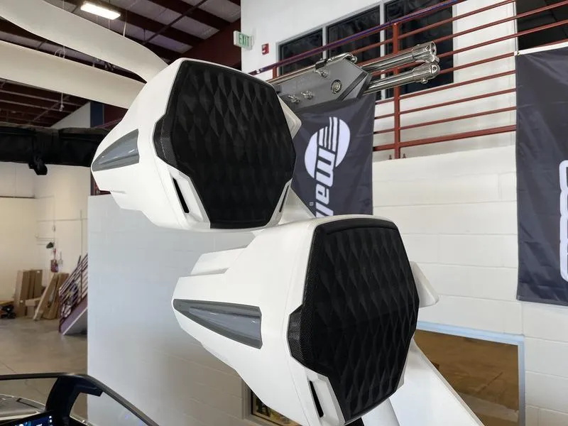 Slide: The Image of 2025 Malibu 25 LSV boat speakers in a showroom setting. - 29