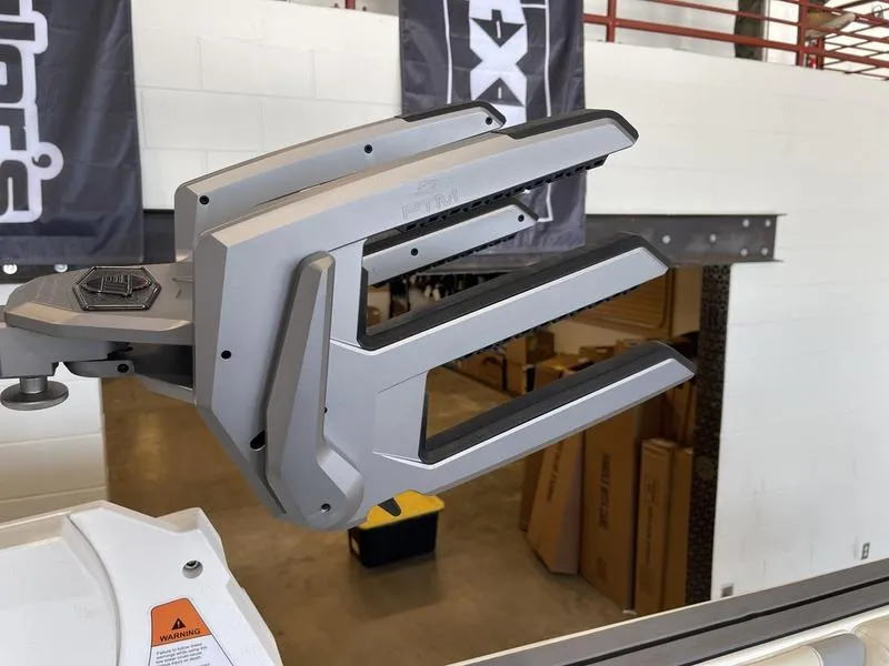 Slide: The Image of 2025 Malibu 25 LSV boat accessory in a showroom setting. - 30