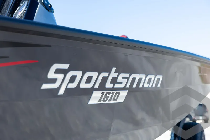 Slide: The Image of 2025 G3 Sportsman 1610 boat side view with logo. - 12