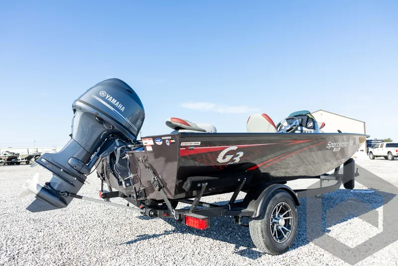 Slide: The Image of 2025 G3 Sportsman 1610 boat with Yamaha outboard motor on a trailer. - 14