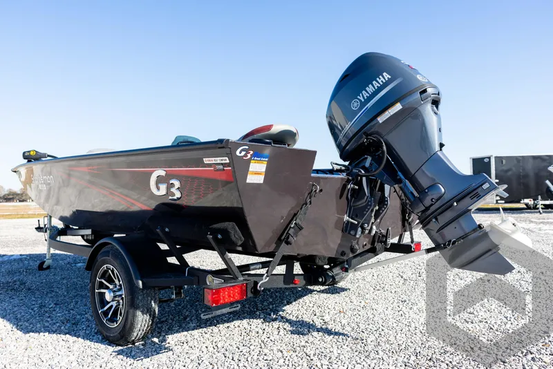 Slide: The Image of 2025 G3 Sportsman 1610 boat with Yamaha outboard motor on gravel. - 24