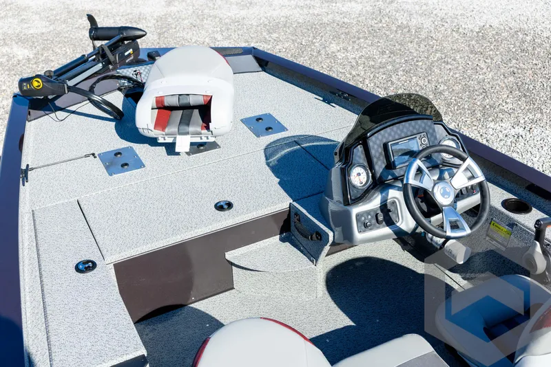 Slide: The Image of 2025 G3 Sportsman 1610 boat interior with steering wheel and seating. - 30