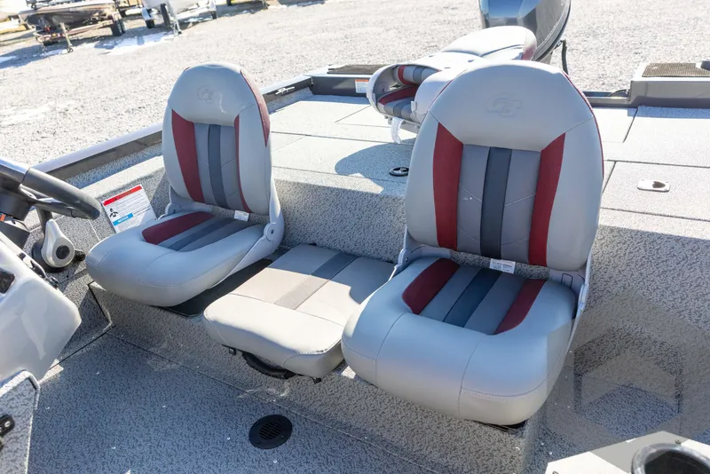 Slide: The Image of 2025 G3 Sportsman 1610 boat interior with two gray and red seats. - 39