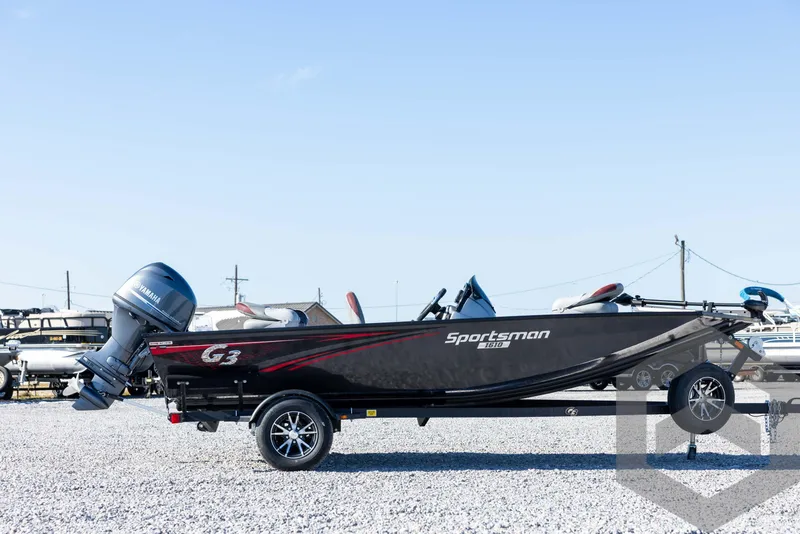 Slide: The Image of 2025 G3 Sportsman 1610 boat on trailer, side view, outdoor setting. - 4