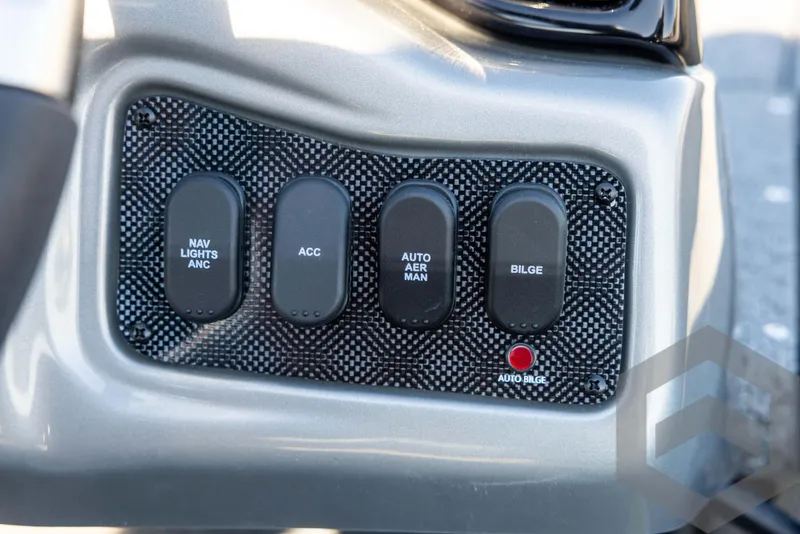 Slide: The Image of Control panel of 2025 G3 Sportsman 1610 boat with labeled switches. - 44