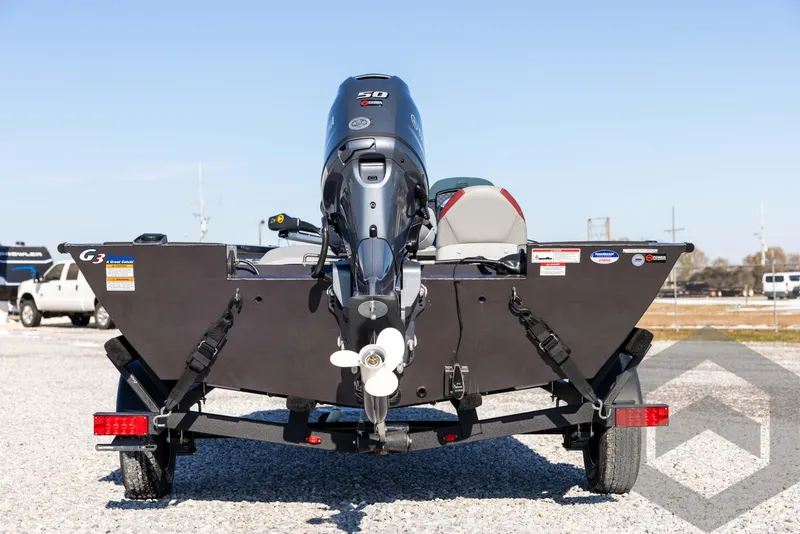 Slide: The Image of 2025 G3 Sportsman 1610 boat on trailer, rear view, outdoors. - 6