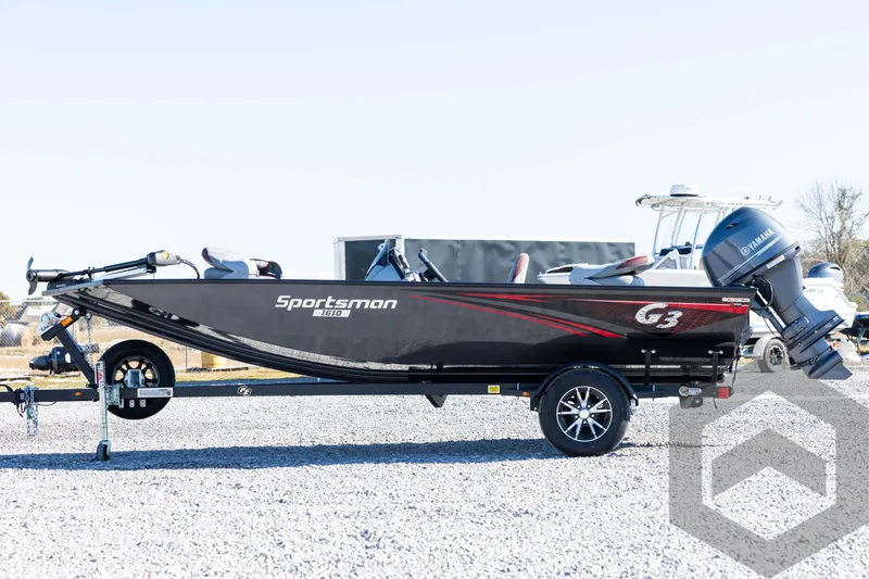 Slide: The Image of 2025 G3 Sportsman 1610 boat on trailer, side view, outdoors. - 8