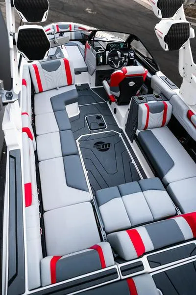 Slide: The Image of 2025 Malibu 25 LSV boat interior with modern seating and sleek design. - 3